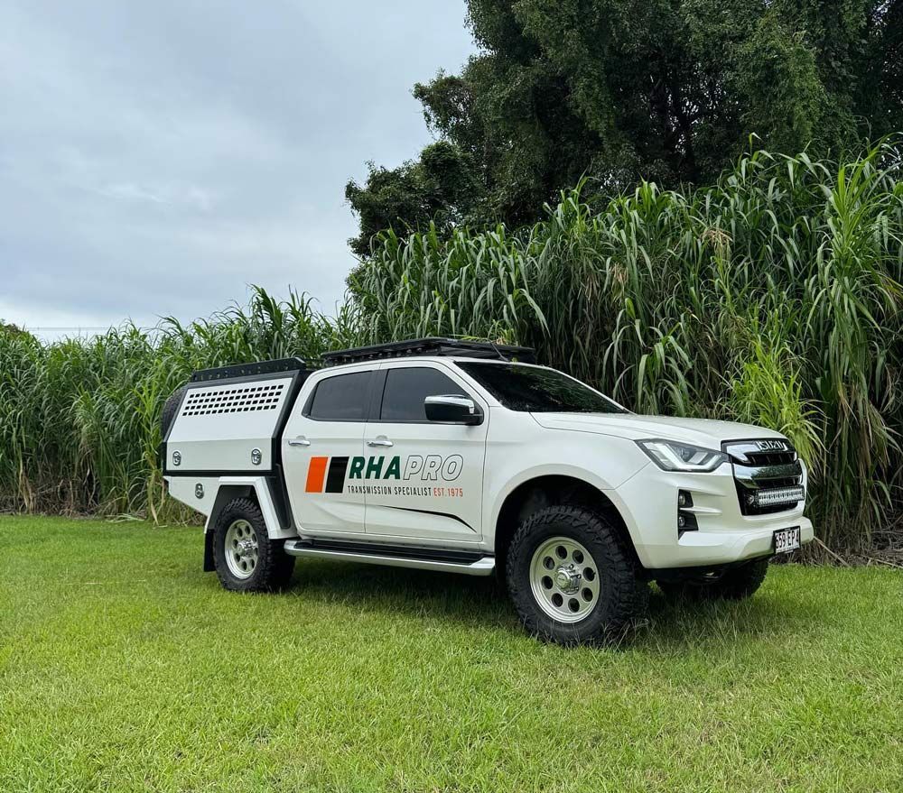 A White Ute With Chassis Mounted Canopy