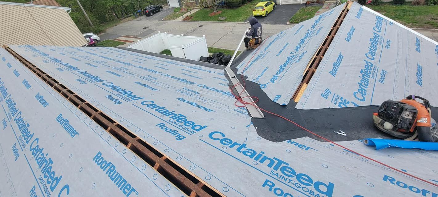 A roof is being installed with a certainteed roofing membrane.