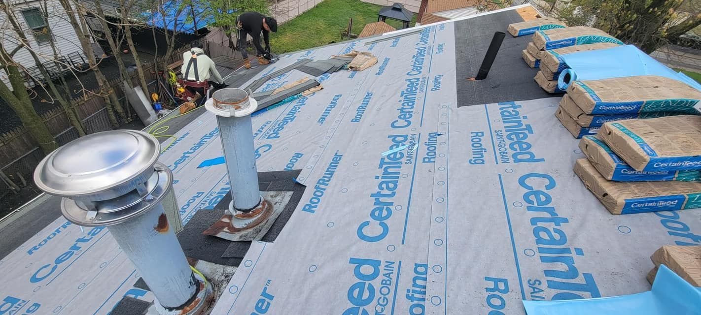 A roof with a chimney on it is being built.