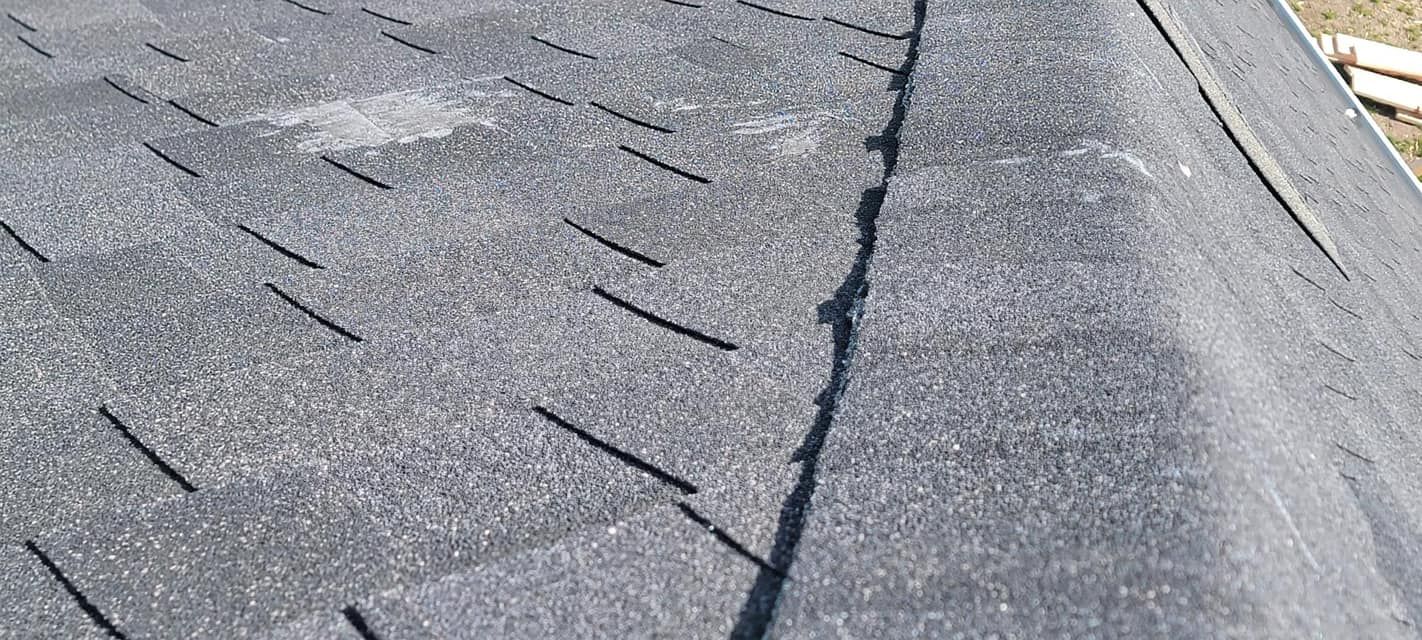 A close up of a roof with a hole in it.