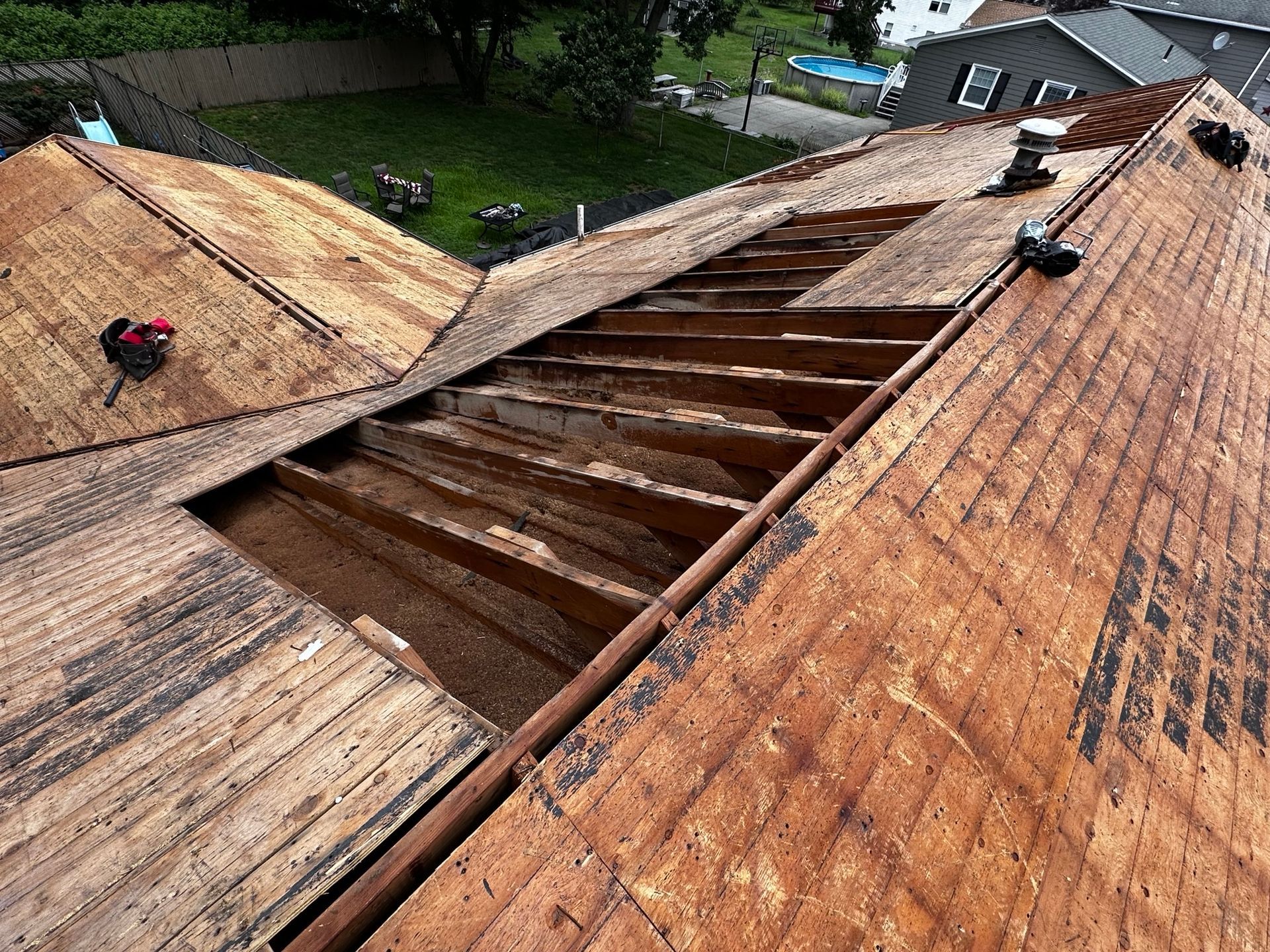 The roof of a house is being remodeled.