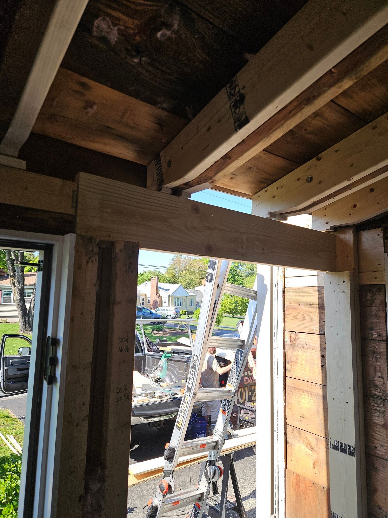 A window in a building with a view of a construction site.