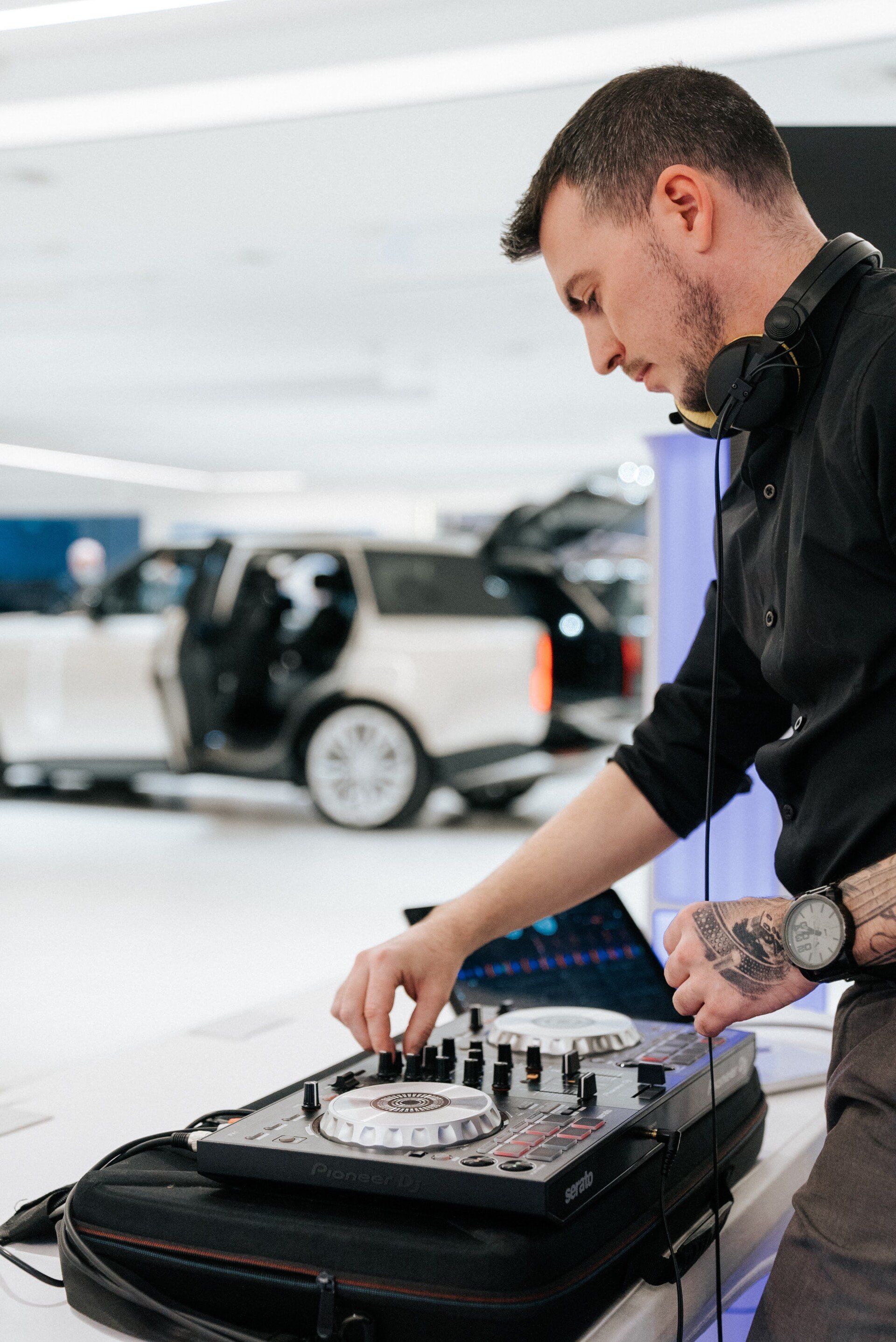 DJ Xander Ale of Spectrum DJs performs at Jaguar Land Rover's new Range Rover Launch in Chester