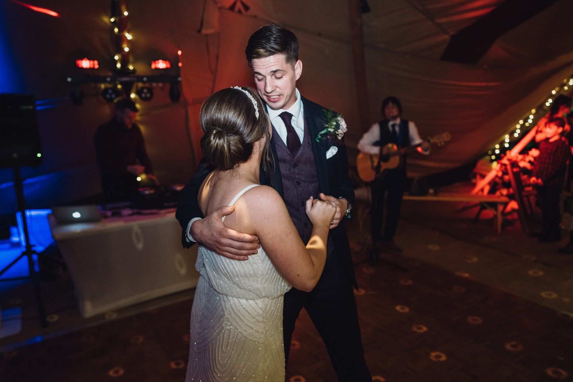 Bride & Groom enjoy their First Dance performed by a family member