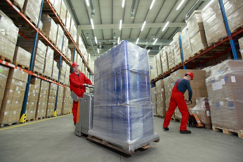 shrink wrapped pallet of goods in a storage facility