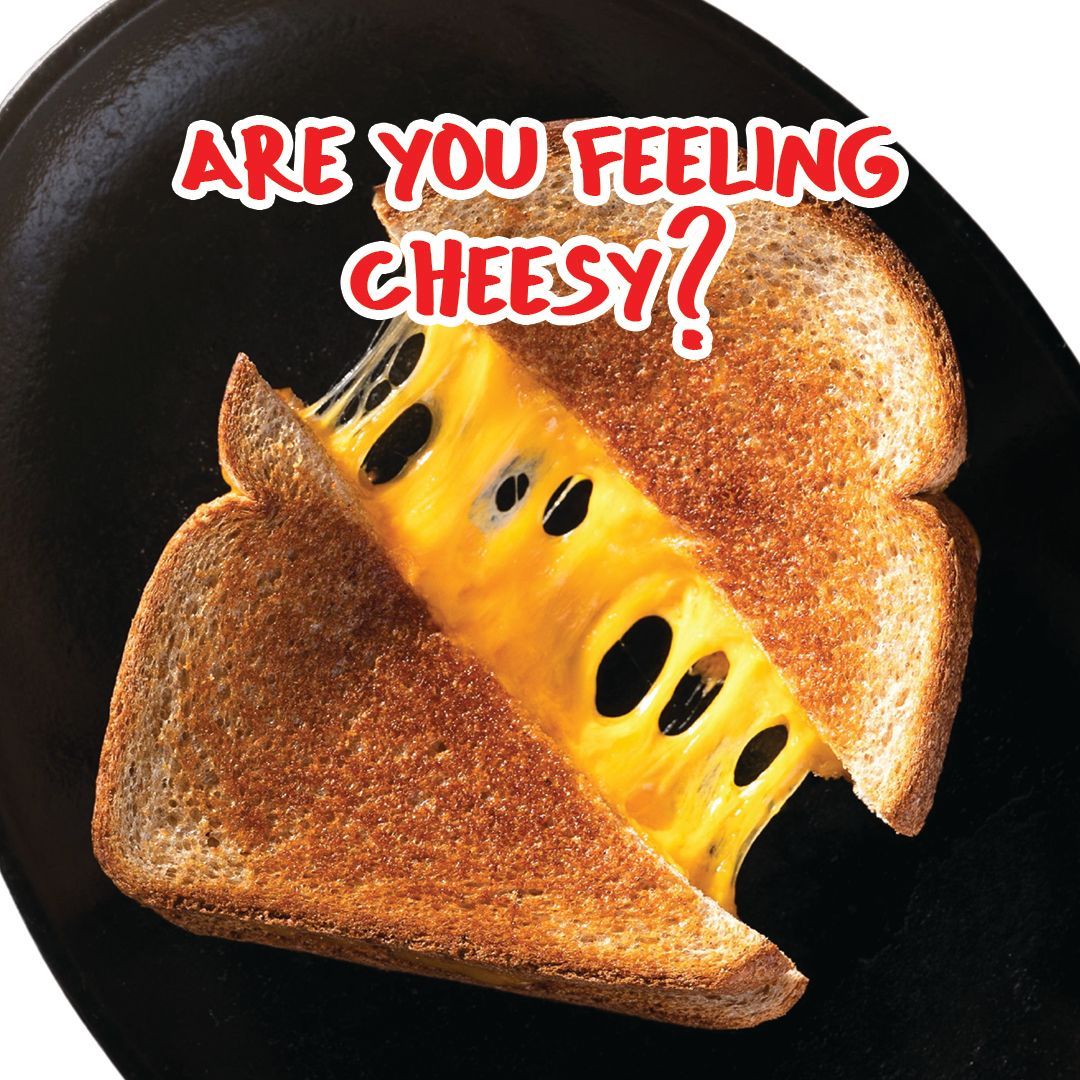 Grilled cheese sandwich with melted cheese, text 