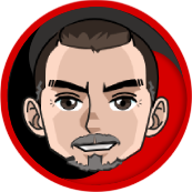 Cartoon man with brown hair, goatee, and smiling face in a red and black circle.