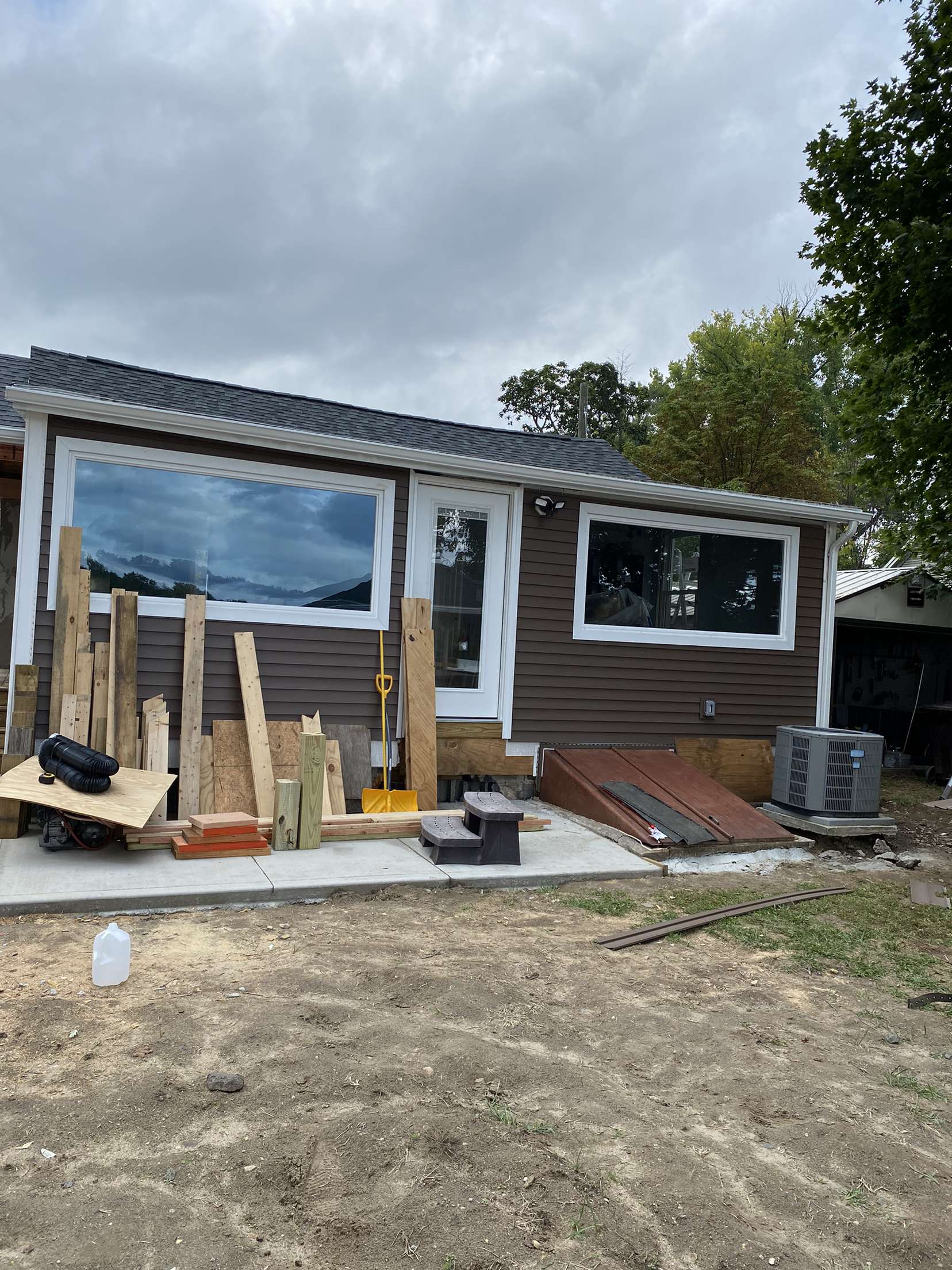 New windows, gutters, door and roof for shed in Agawam, MA.