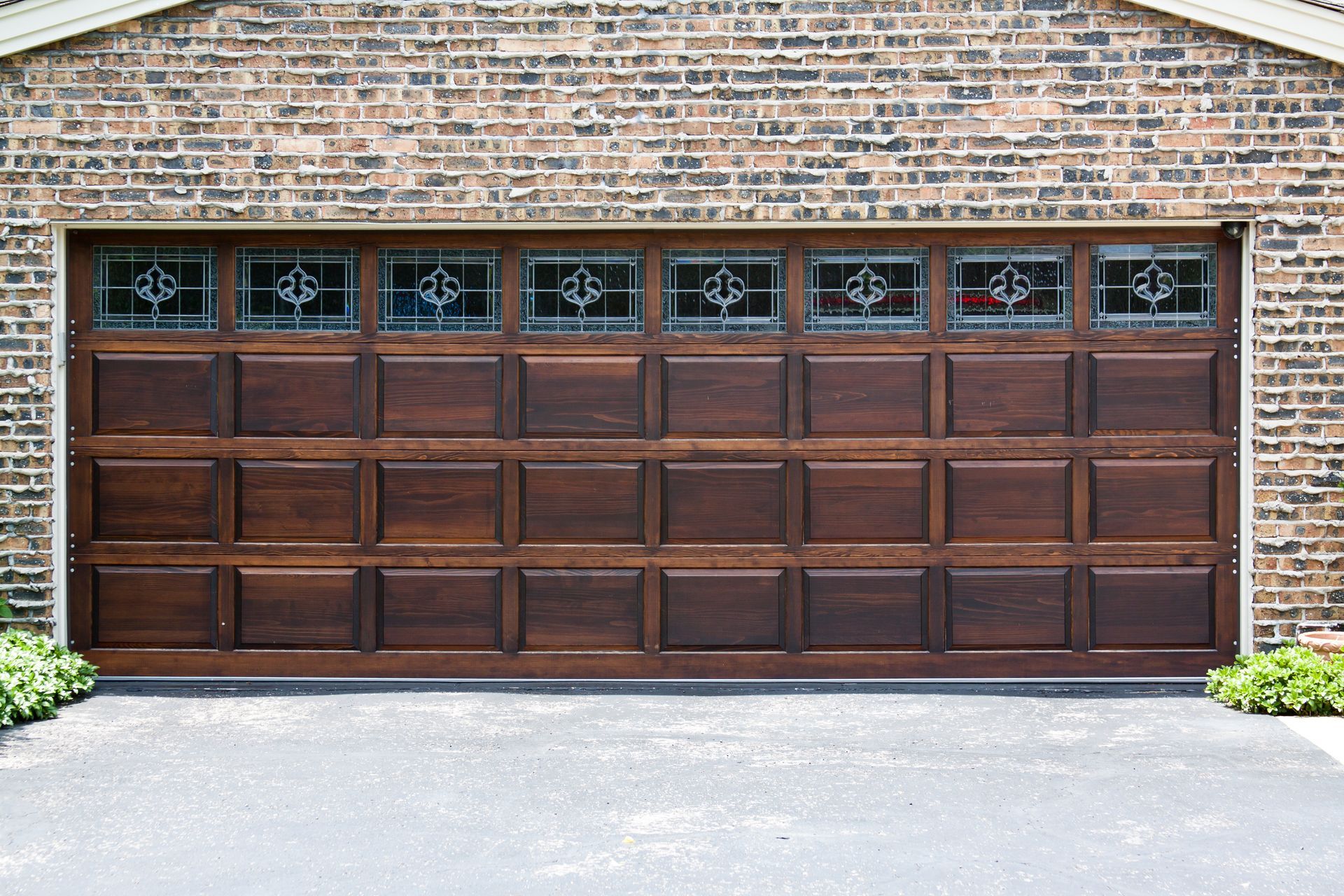 Original style raised panel garage doors.