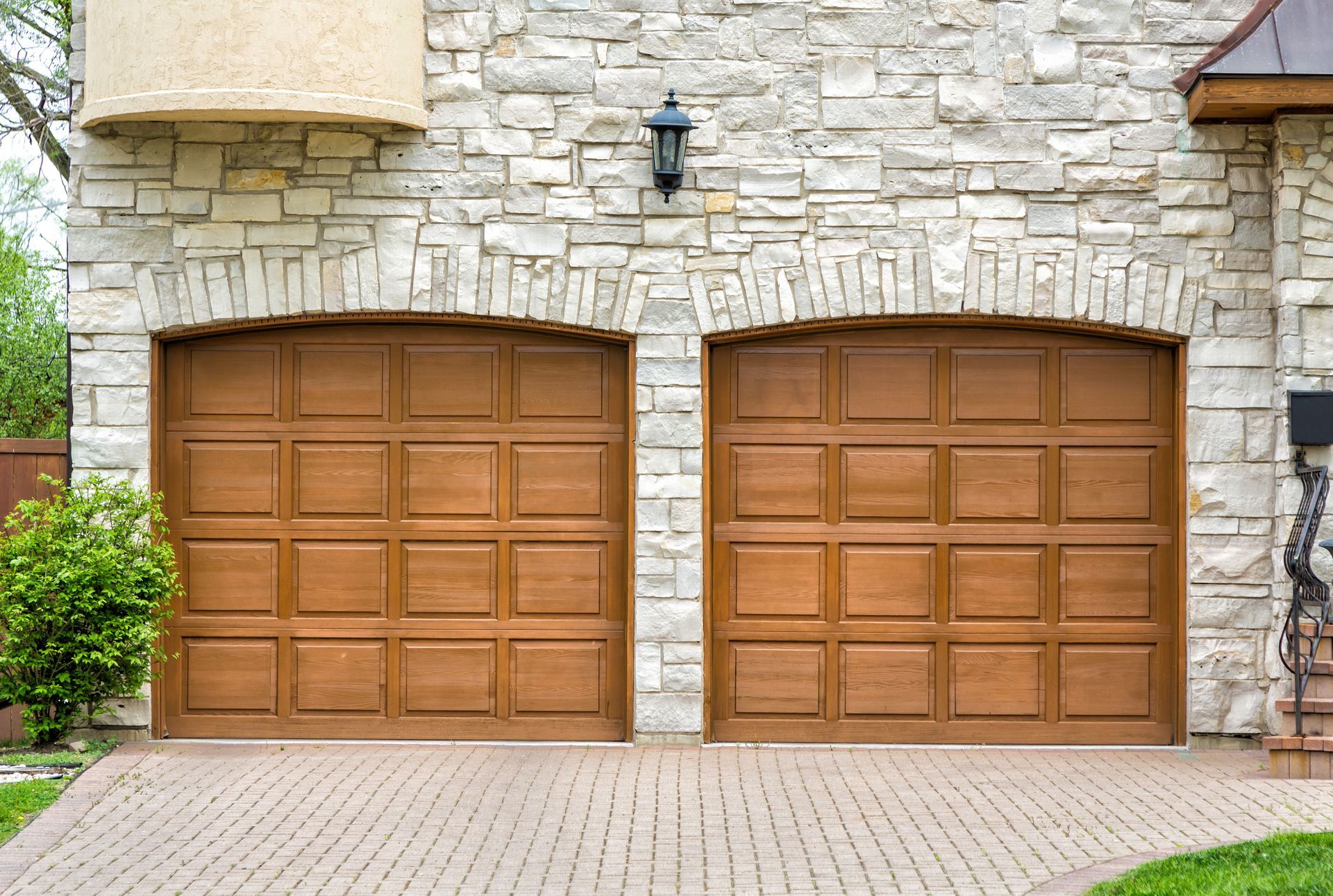 Short raised panel garage doors.