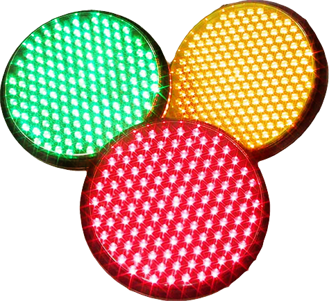 Traffic signal with illuminated green, yellow, and red lights.