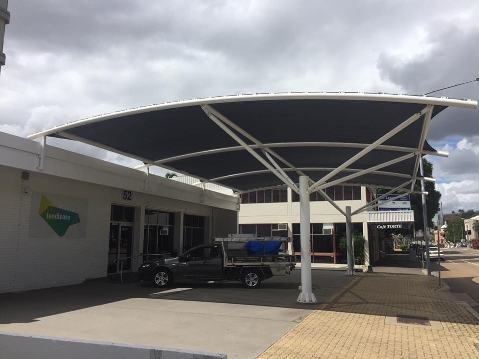 Shade Sail Outside Shop — Professional Shade Sail Installation in Garbutt, QLD