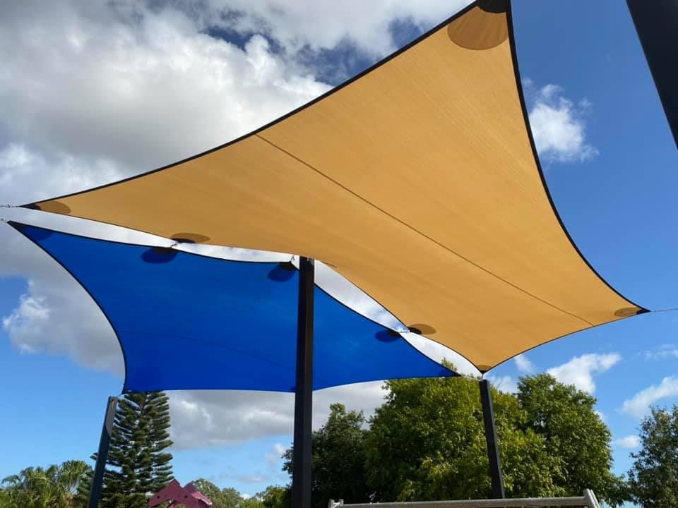 Blue and Orange Shade Sail — Professional Shade Sail Installation in Townsville, QLD