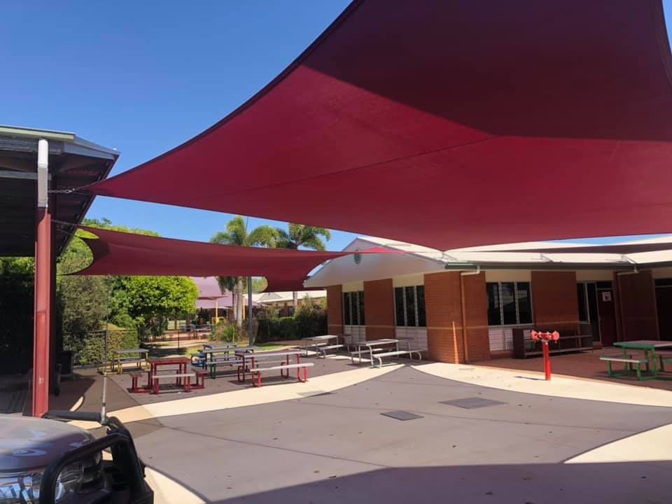 Canteen Area Installed with Red Shade Sails — Professional Shade Sail Installation in Ayr, QLD