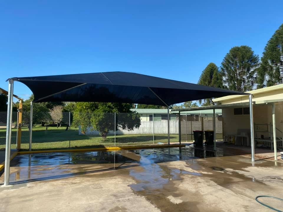 Home Parking Area with Shade Installed — Professional Shade Sail Installation in Garbutt, QLD