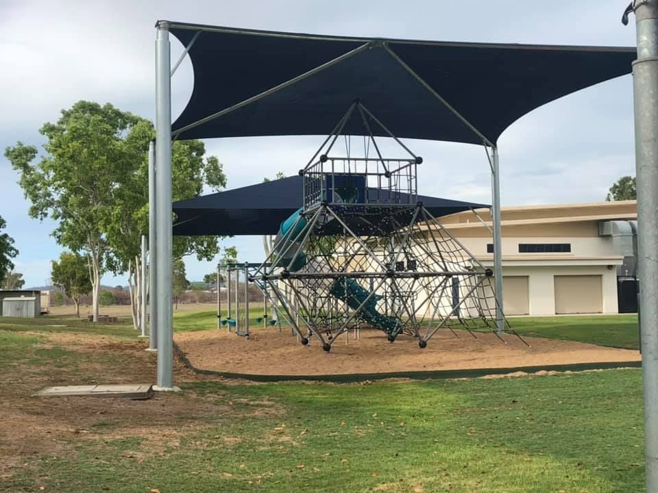 Jungle Gym in Public Park with a Shade Sail — Professional Shade Sail Installation in Garbutt, QLD