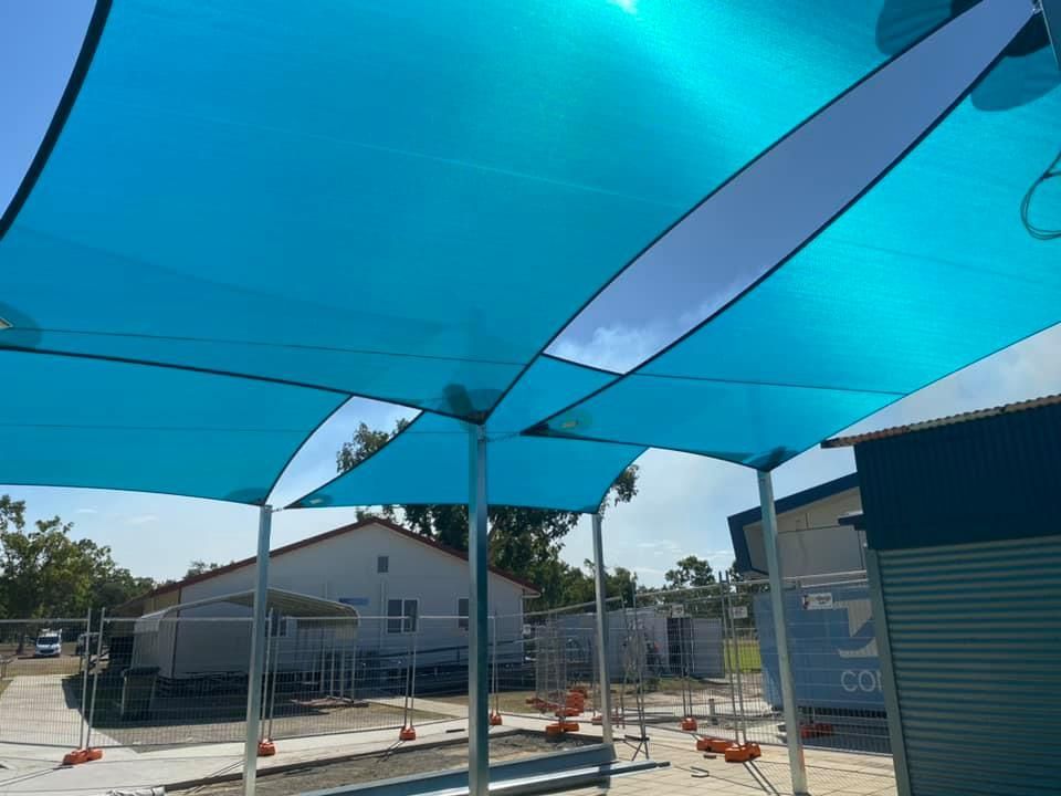 Light Blue Shade Sails — Professional Shade Sail Installation in Townsville, QLD