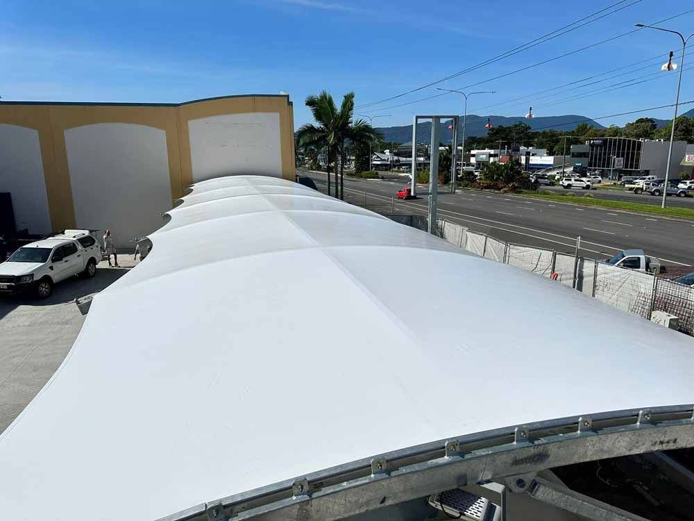 Long Commercial Shade Sail — Professional Shade Sail Installation in Garbutt, QLD