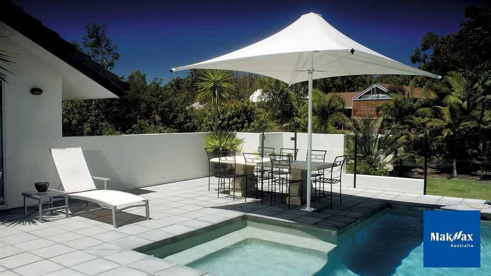 Poolside Umbrella — Professional Shade Sail Installation in Garbutt, QLD