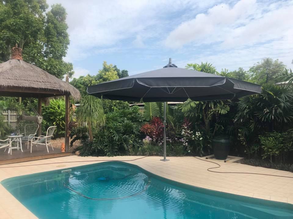 Poolside Umbrellas — Professional Shade Sail Installation in Mount Isa, QLD