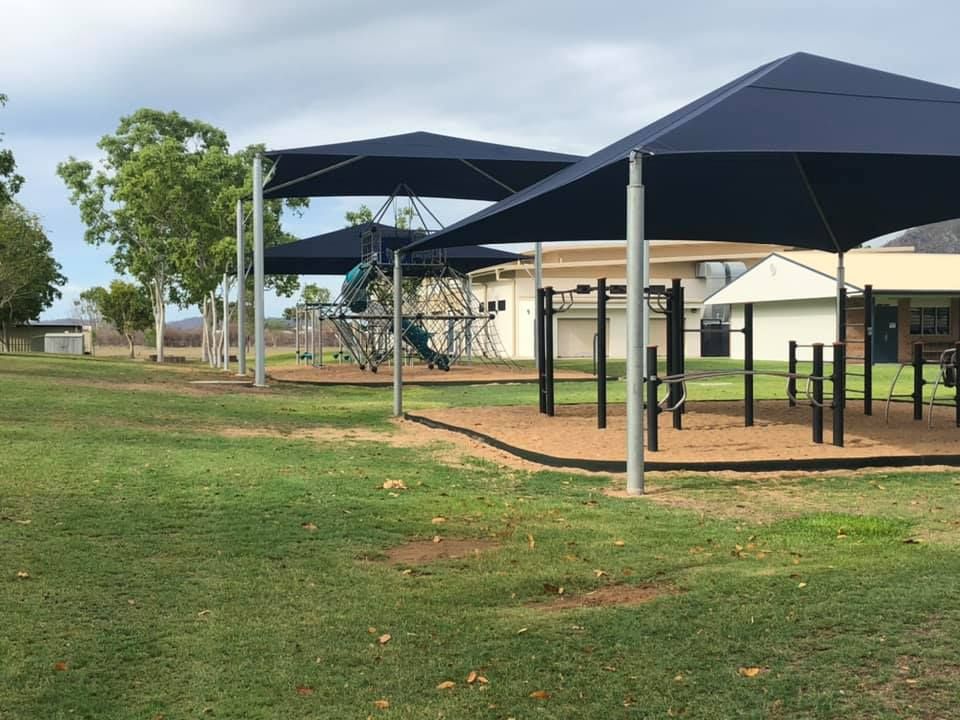 Public Playground with Umbrellas — Professional Shade Sail Installation in Garbutt, QL
