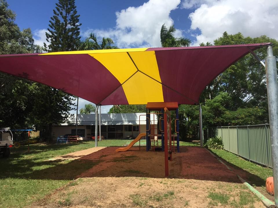 Red and Yellow Shade — Professional Shade Sail Installation in Garbutt, QLD