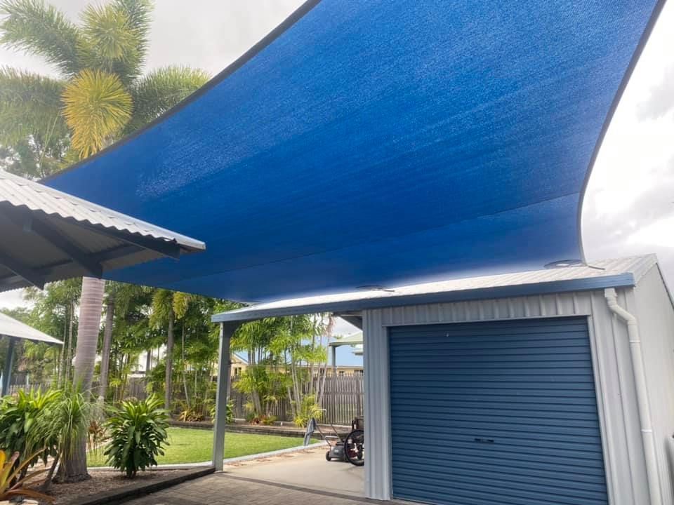 Small Carport with a Blue Shade Sail — Professional Shade Sail Installation in Townsville, QLD