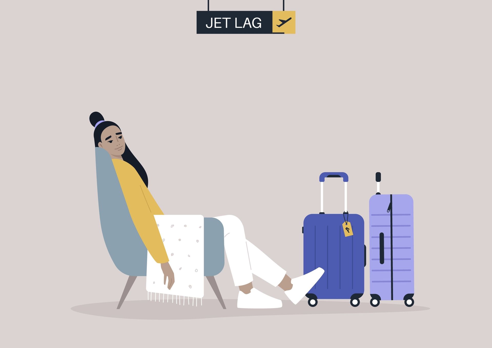 A woman is sitting in a chair with her feet up next to a suitcase.