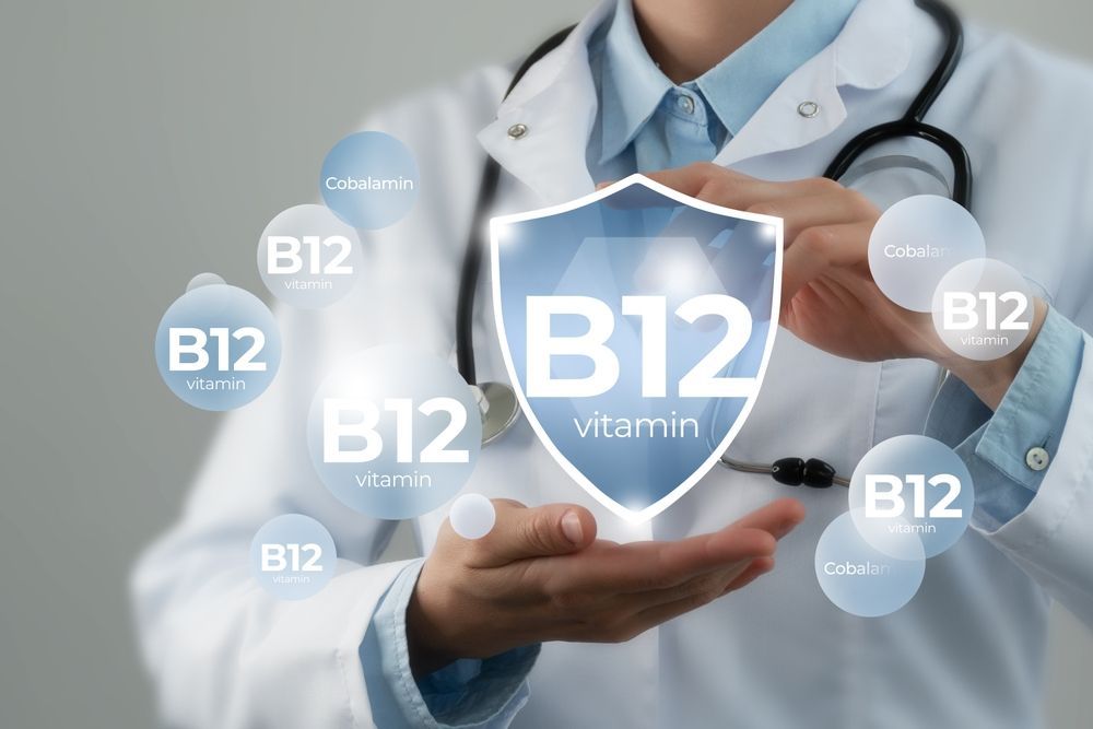 A doctor is holding a shield with the word b12 on it.