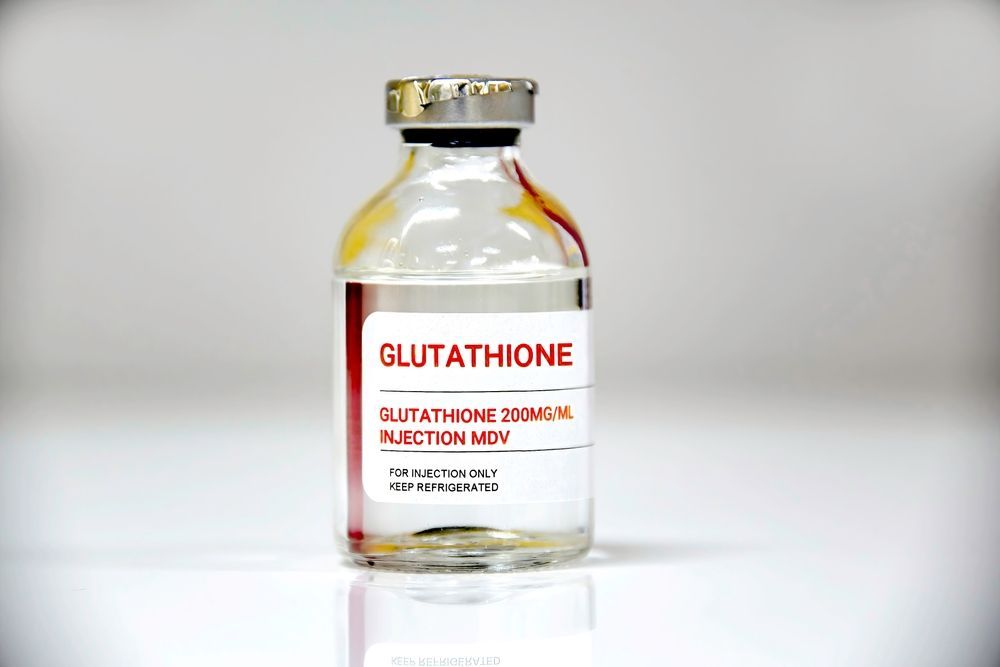 A bottle of glutathione is sitting on a table.