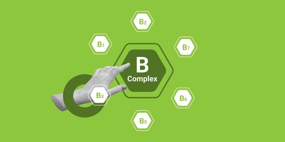 A hand is pointing at a button that says b complex.