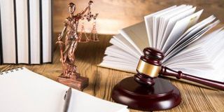 Lady of justice, gavel and books - Attorney at Law in New Castle, PA