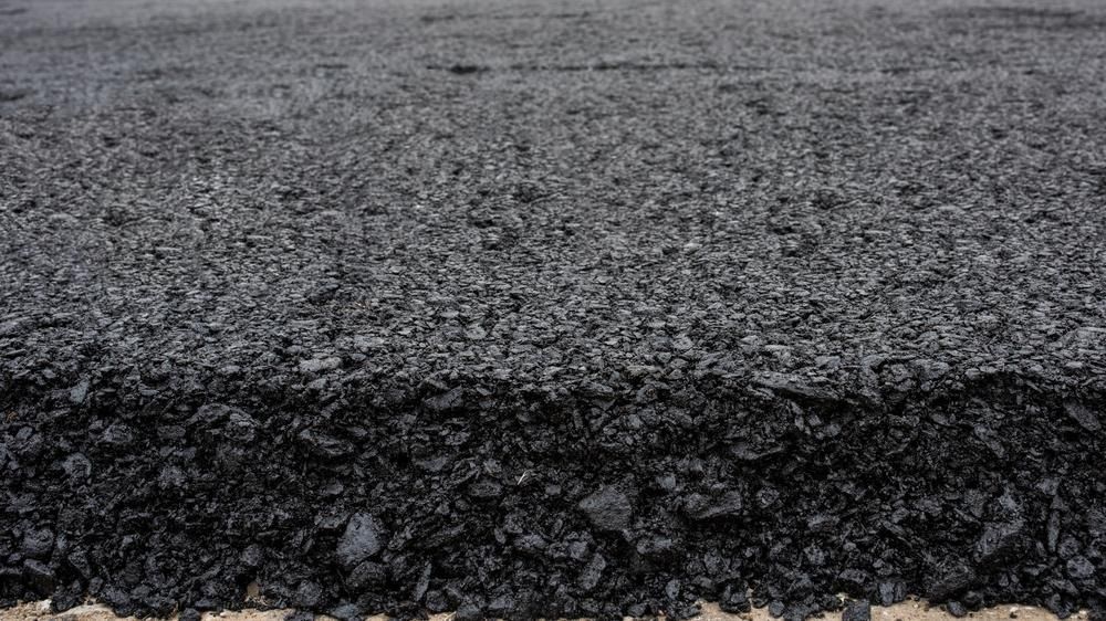 A Close Up of a Piece of Asphalt on a Road — Chooks Sand And Gravel In Paget, QLD