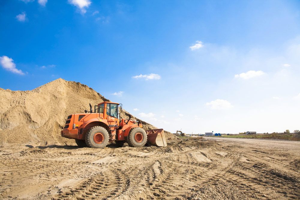 Orange Bulldozer on A Construction Site — Chooks Sand And Gravel In Proserpine, QLD