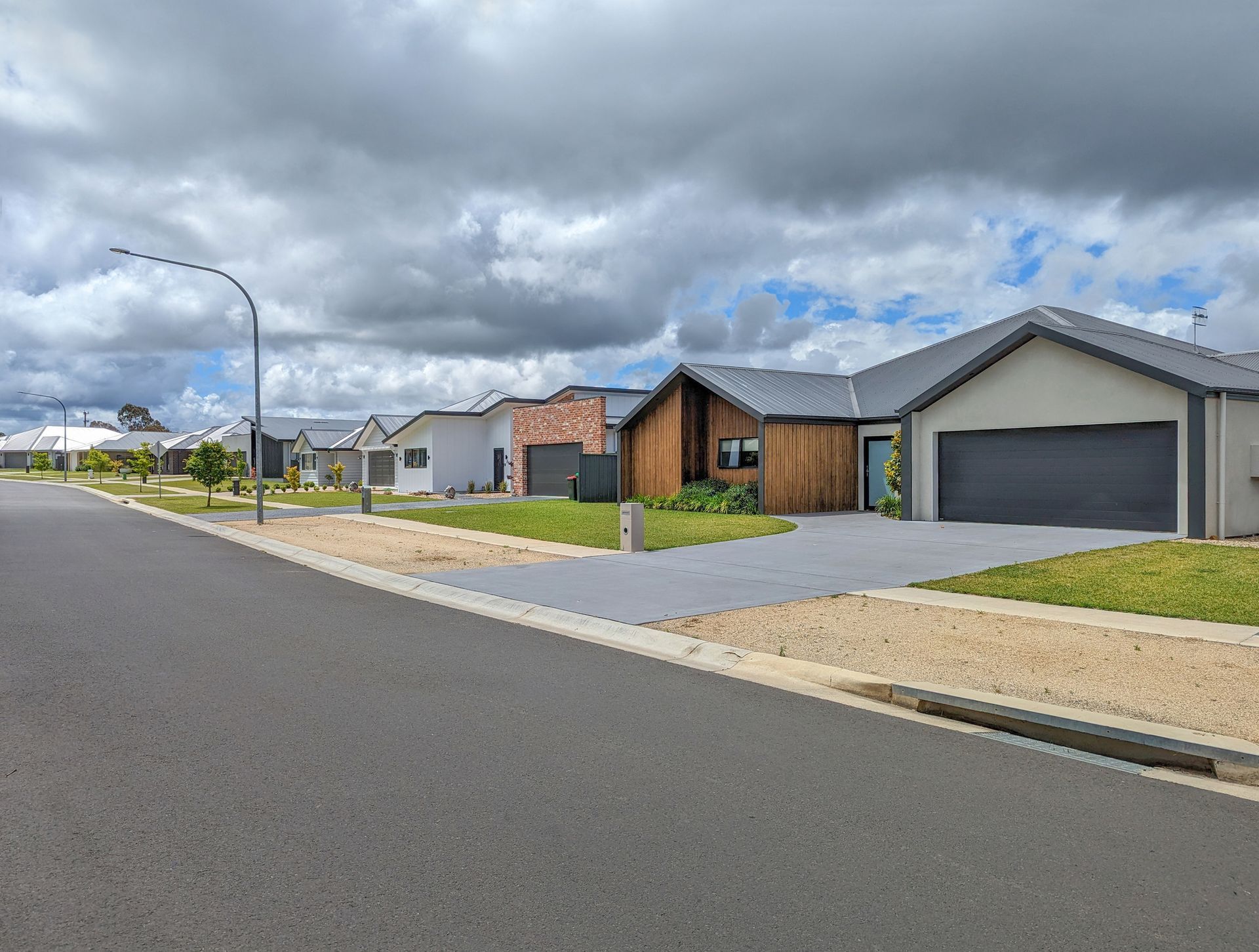Suburban home with a concrete driveway.