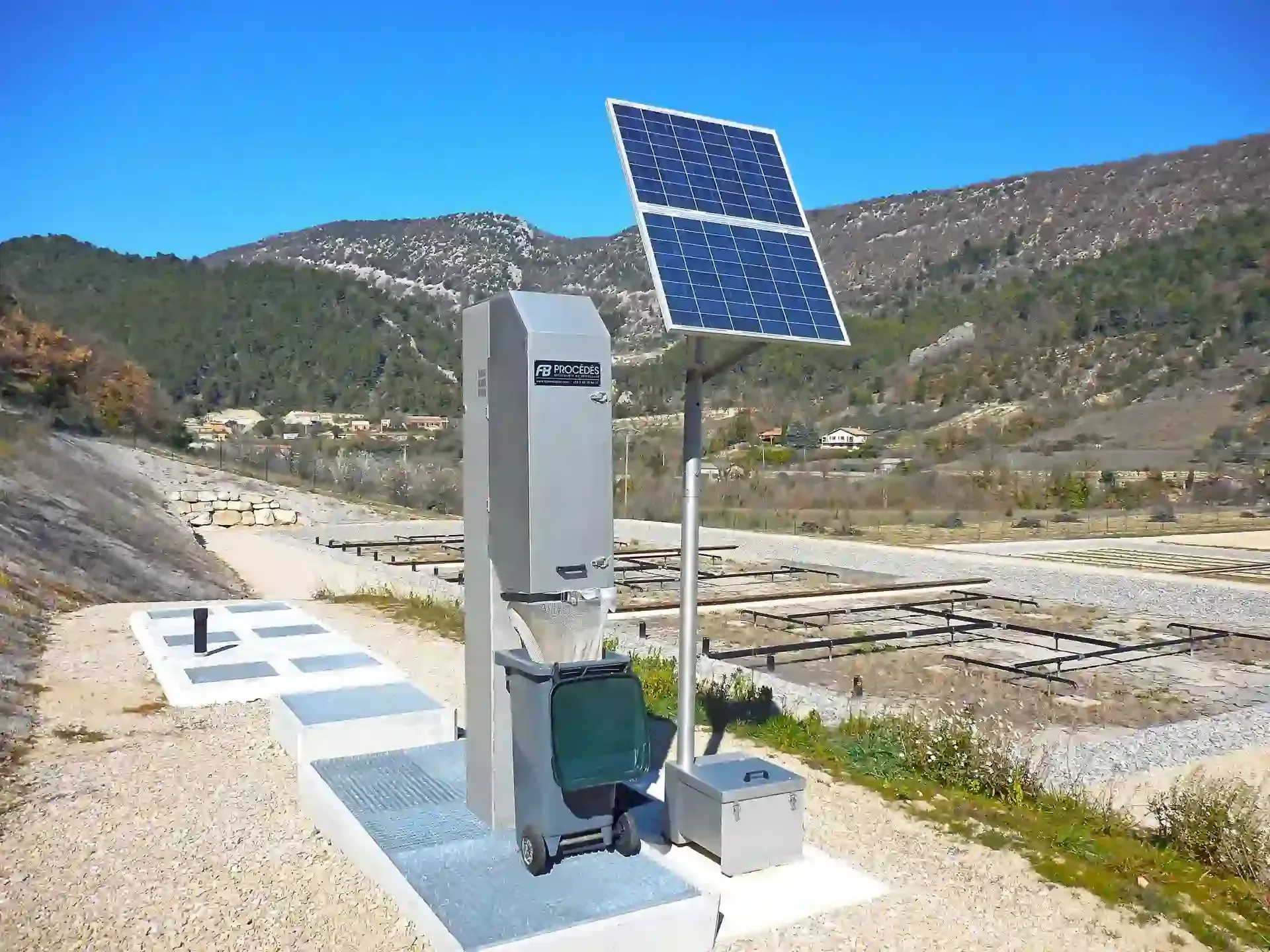 Solar-Powered Trash Compactor Near a Debris Basin