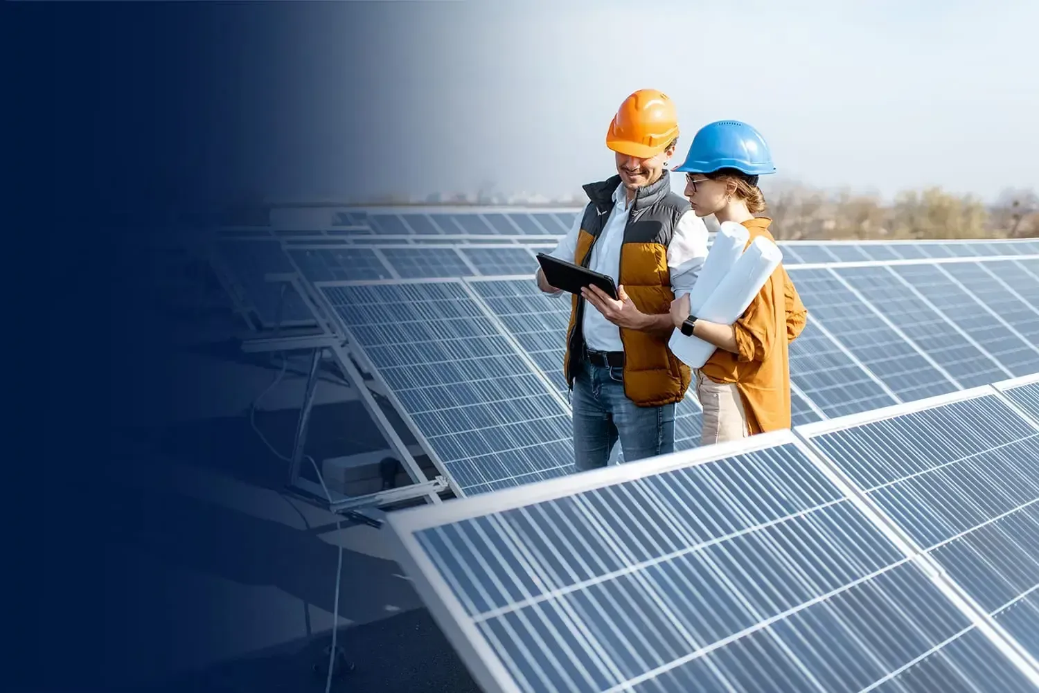 Solar Panel Technicians Reviewing the Plans