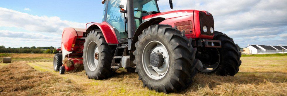 A tractor with new large tyres