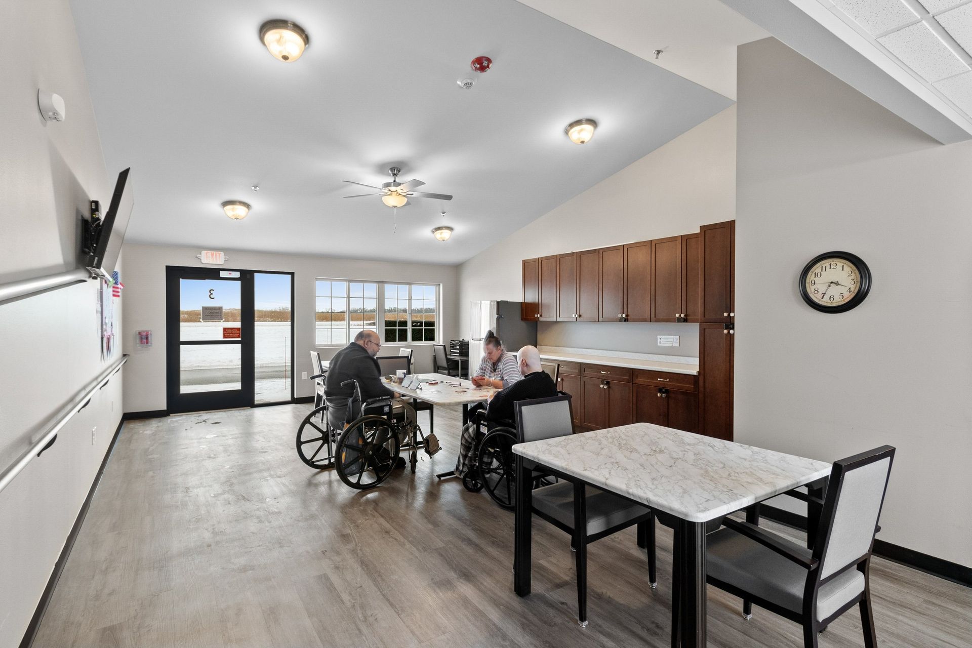 A living room with a couch a chair and a table