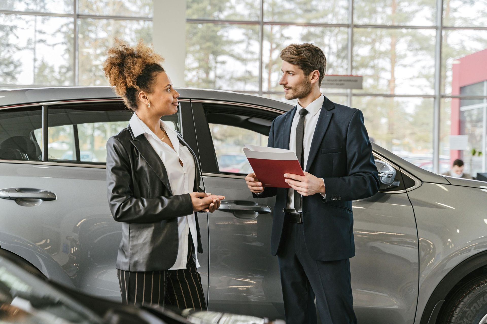 broker with car buyer: Brisbane brokers help first time buyers with car loans.