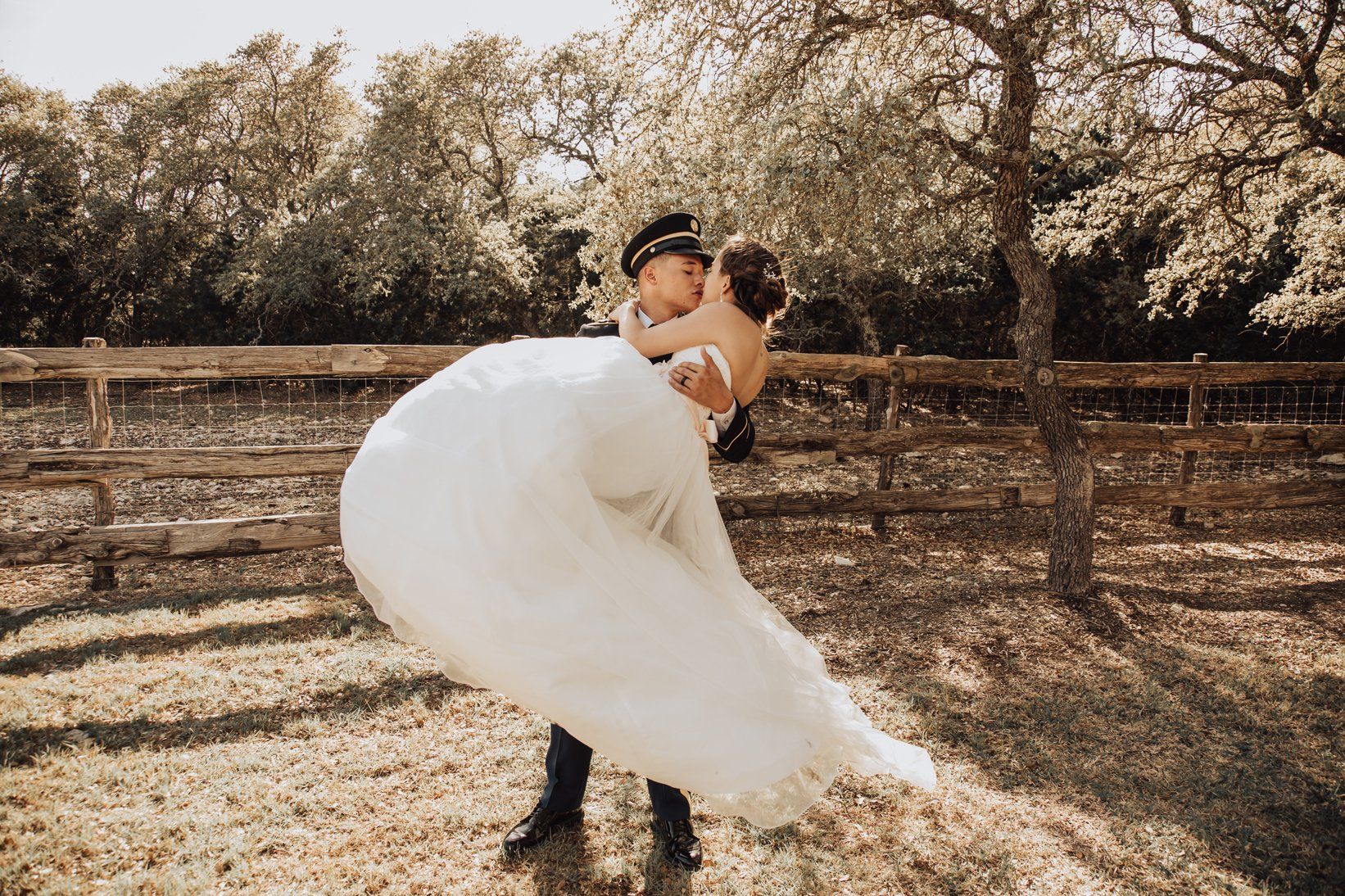 Groom Carries Bride - Outdoor - Rustic Country Wedding Location - Austin