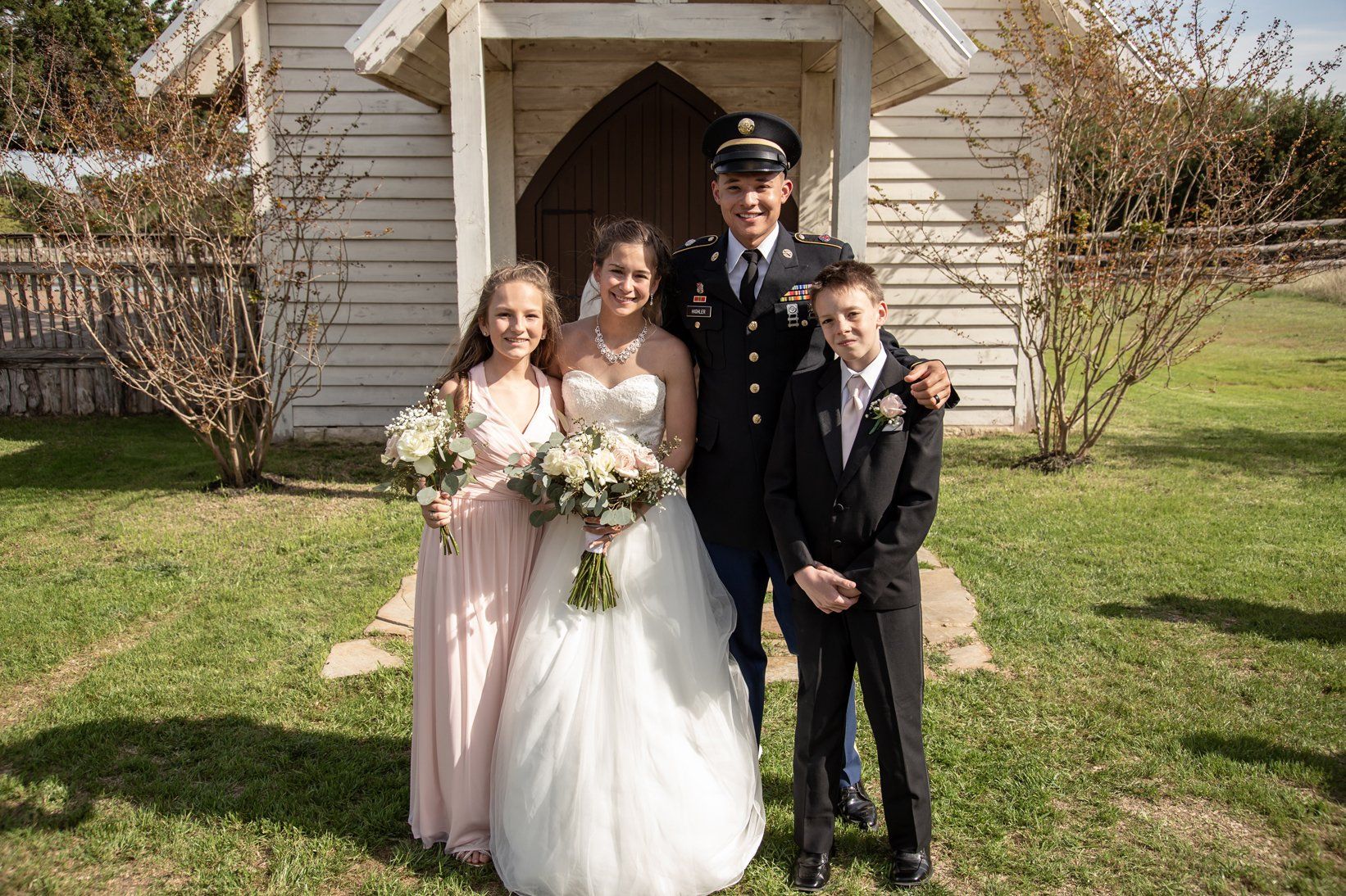 Austin Wedding Venue - Wedding Party with Teens in front of Chapel