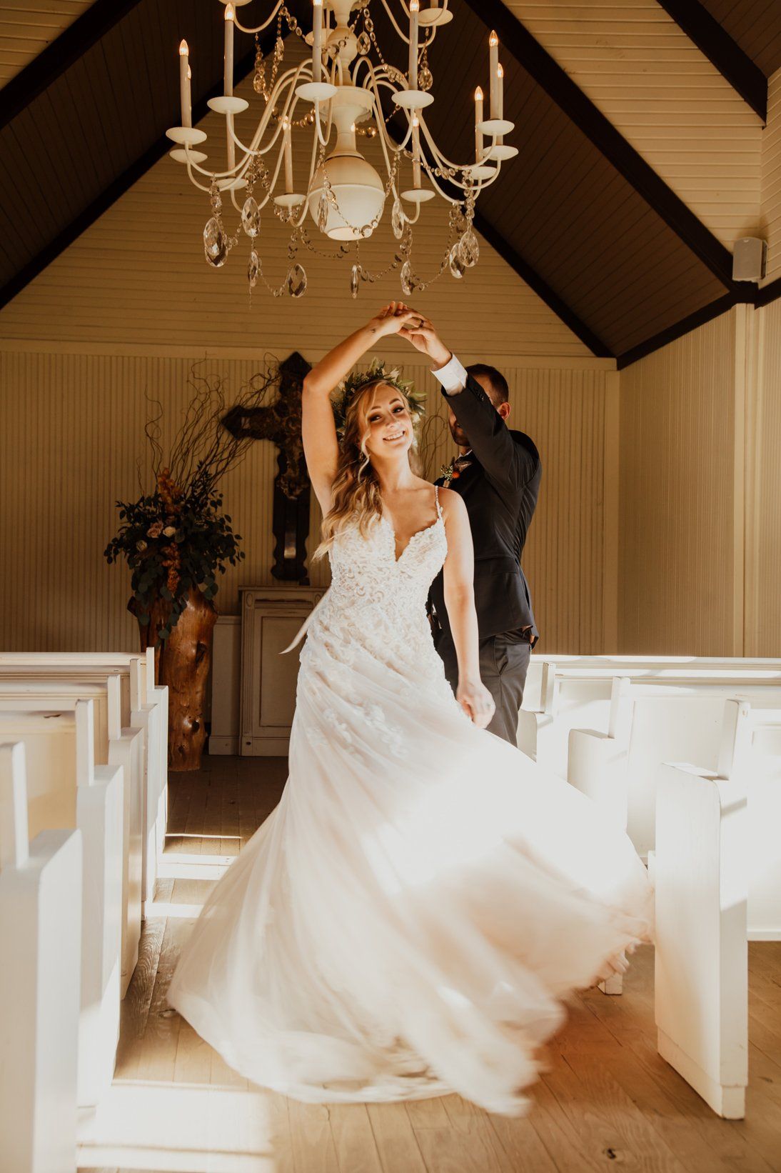Groom Twirls Bride in Chapel - Country Wedding - Venue Location - Austin