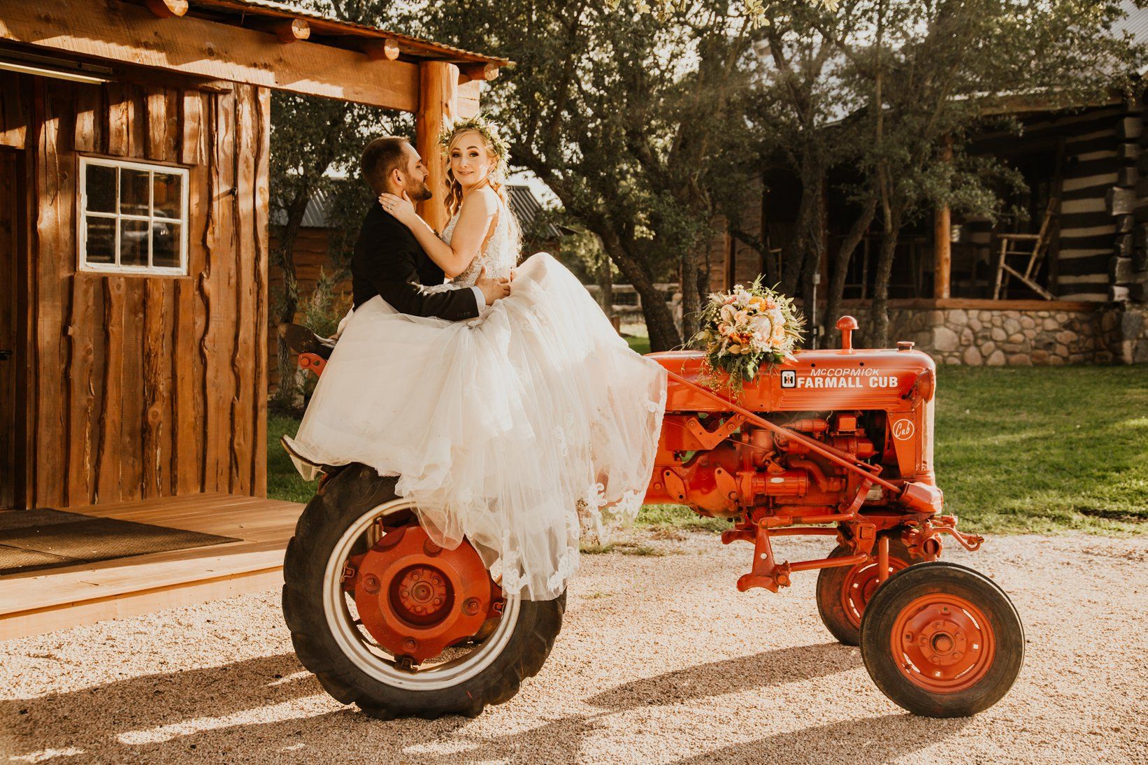 Bride and Groom - Tractor - Country Wedding Reception Rental Location - Austin