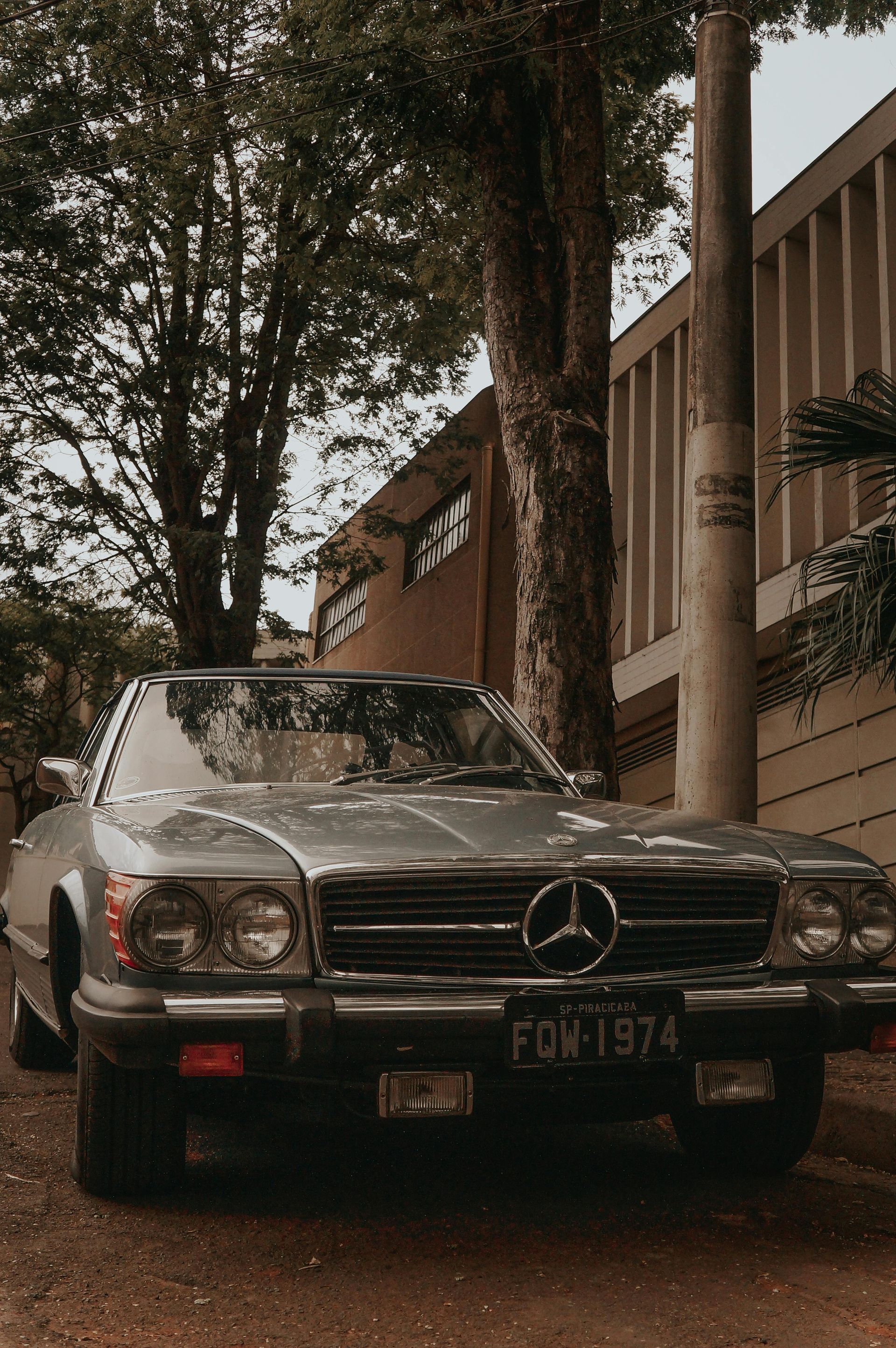 A toyota supra is parked on the side of the road.