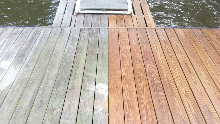 A before and after picture of a wooden deck being cleaned, next to a body of water.