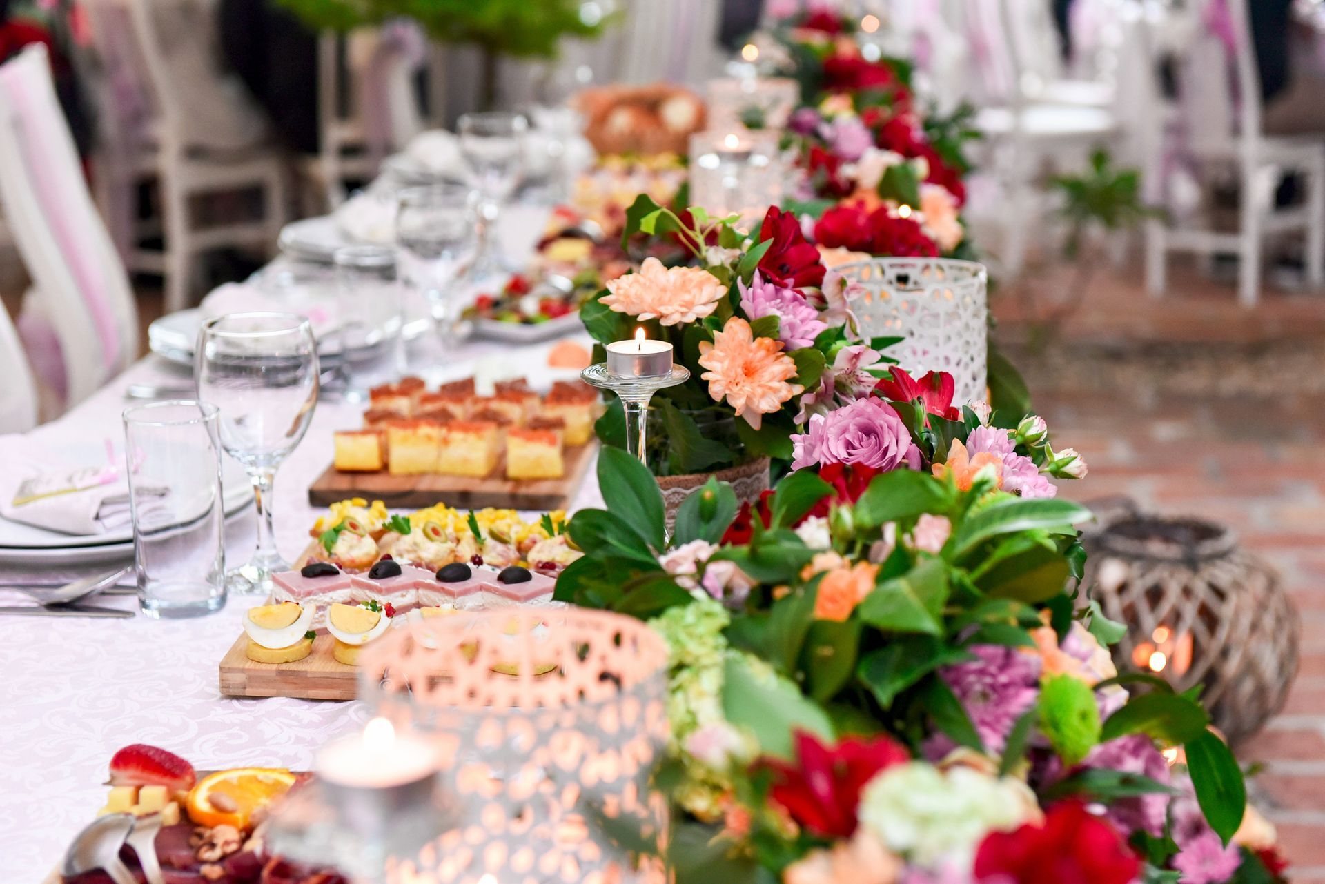 A close up of a bouquet of flowers on a table. A close up of a bouquet of flowers on a table.