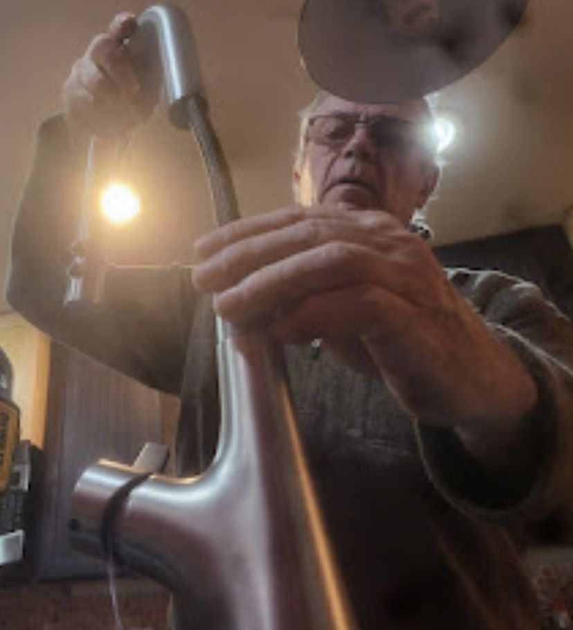 Dan is fixing a kitchen faucet