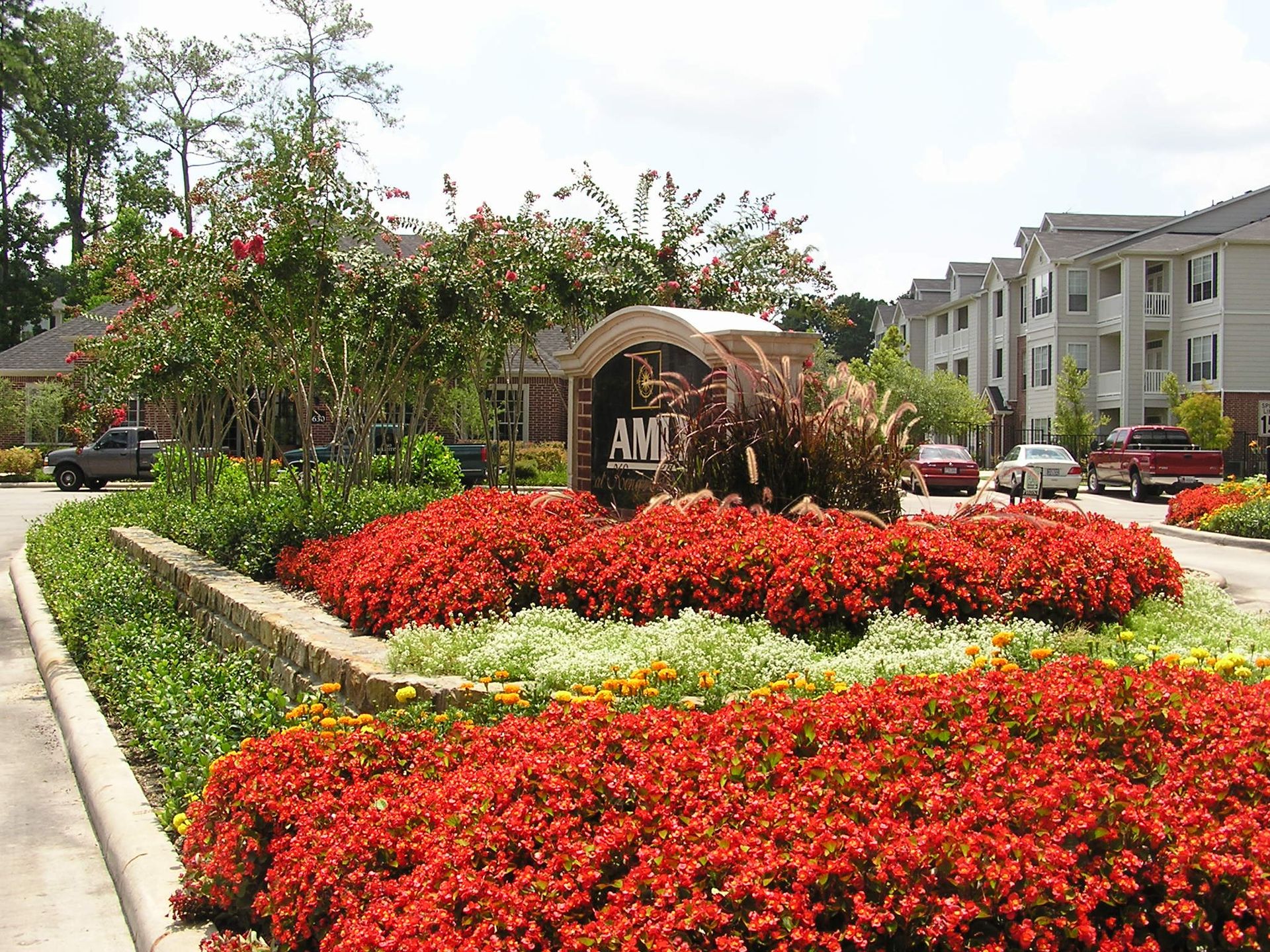 A sign in the middle of a garden says awp