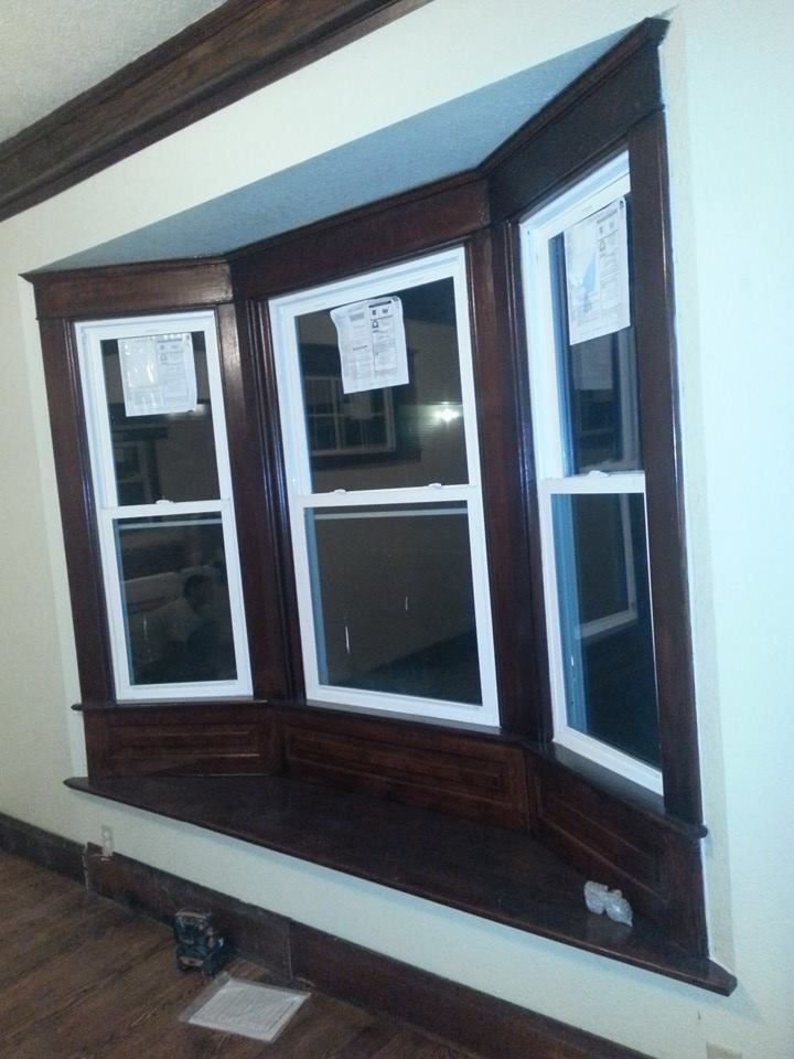 A bay window with three windows in a room